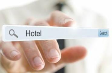 A person with their finger on a floating search bar