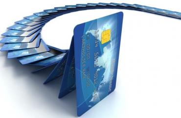 credit cards falling like dominos