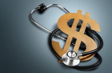 A dollar sign wrapped in a stethoscope