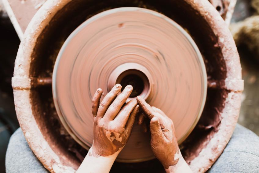 making a clay bowl by hand