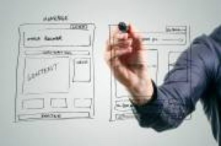 designer drawing website development wireframe